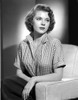 Peggy Castle Seated in Checkered Polo Looking Away Portrait Photo Print - Item # VARCEL695938