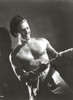 Kirk Douglas Pulling Pose Undress Portrait Photo Print - Item # VARCEL695964