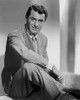 Cary Grant sitting Down In Suit With Arm On Leg High Qu Photo Print - Item # VARCEL695966
