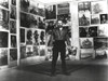 Kirk Douglas with his Photos Black and White Photo Print - Item # VARCEL696025