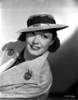 Gail Patrick on a Coat with Hat and smiling Portrait Photo Print - Item # VARCEL703013