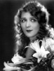 Mary Pickford Carrying a Flowers Photo Print - Item # VARCEL703090