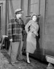Human Desire Man in Checkered is Taking the Woman in Dress Photo Print - Item # VARCEL703232