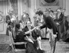 Song To Remember Man Holding a Woman's Hand in a Movie Scene Photo Print - Item # VARCEL703241