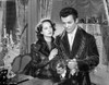Song To Remember Woman Holding on a Man's Arms in a Movie Scene Photo Print - Item # VARCEL703247