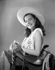 Ella Raines on a Printed Sleeveless Top Photo Print - Item # VARCEL703352