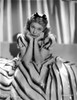 Martha Raye on a Printed Gown and sitting Photo Print - Item # VARCEL703517