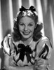 Martha Raye wearing Stripe Puff Sleeves and smiling Photo Print - Item # VARCEL703491