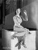 Martha Raye on a Printed Dress sitting and Hand on Air Photo Print - Item # VARCEL703528