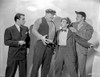 Smuggler's Cove Three Men Arguing in a Movie Scene Photo Print - Item # VARCEL703514