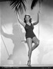 Martha Raye posed on a Swing Photo Print - Item # VARCEL703525