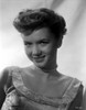 Debbie Reynolds smiling in White Dress with Pearl Choker Photo Print - Item # VARCEL703616