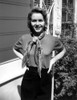 A Portrait Of Debbie Reynolds Wearing A Scarf Outdoors Photo Print - Item # VARCEL703621