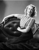 Ann Richards sitting on the Couch in Classic Photo Print - Item # VARCEL703748