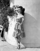 Ann Rutherford Leaning on the Wall wearing a Dress Photo Print - Item # VARCEL704086