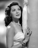 Ann Rutherford Leaning on the Wall wearing a Strapless White Dress Photo Print - Item # VARCEL704064