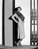 Sylvia Sidney Leaning on Wall in a Furry Scarf Photo Print - Item # VARCEL704473