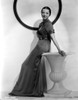 Sylvia Sidney sitting and posed in Gown Photo Print - Item # VARCEL704475