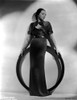 Sylvia Sidney standing and Holding a Ring in a Long Gown Photo Print - Item # VARCEL704485