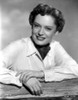 Alexis Smith Leaning on a Fence wearing White Long Sleeves Photo Print - Item # VARCEL704762
