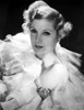 Lilyan Tashman posed in White Gown with Black Background Photo Print - Item # VARCEL705010