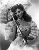 Ann Todd wearing a White Gown with Matching Umbrella Photo Print - Item # VARCEL705085