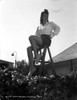 Claire Trevor sitting on Chair, wearing White Long Sleeve Photo Print - Item # VARCEL705202