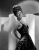 Claire Trevor Leaning on Wall, wearing Black Dress with Hand on Hips Photo Print - Item # VARCEL705224