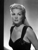 Claire Trevor Posed Sideways in Black Dress Portrait Photo Print - Item # VARCEL705263