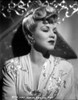 Claire Trevor Looking Away in Floral Dress Portrait Photo Print - Item # VARCEL705271