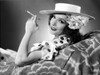 Lupe Velez smiling in polka dot while Holding a Cigarette Photo Print - Item # VARCEL705347
