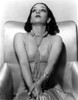 A portrait of Lupe Velez sitting in a arm chair Photo Print - Item # VARCEL705341