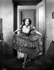 Lupe Velez Running in Elegant Dress with Heels Photo Print - Item # VARCEL705351