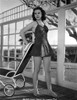 Jane Withers Posed in Black Linen Strap Dress with Short Skirt Photo Print - Item # VARCEL705631