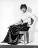 Anna Wong sitting on the Chair, Hand on Hips Photo Print - Item # VARCEL705695