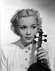 Jane Wyman Portrait in White Long Sleeve Shirt with Hand Holding a Violin Photo Print - Item # VARCEL705851