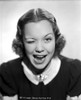 Jane Wyman Portrait in Black Velvet Short Sleeve Dress and White Collar with Right Eye Winked Photo Print - Item # VARCEL705884