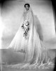 Jane Wyman Posed in White Silk Long Sleeve Wedding Dress and Long Sheer Veil Photo Print - Item # VARCEL705894