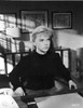 Anne Francis sitting in Black Sweater Photo Print - Item # VARCEL705989