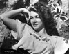 Linda Christian Leaning on Rocks in Classic Portrait Photo Print - Item # VARCEL705963