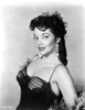 Mari Blanchard Posed in Black Dress with Earrings Photo Print - Item # VARCEL706047