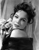Leslie Caron Portrait in Classic with A Bouquet of Flowers Photo Print - Item # VARCEL706078