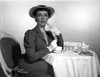 Phyllis Kirk Drinking Tea wearing Black Formal Dress with Hat Photo Print - Item # VARCEL706143