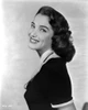 Julie Adams Portrait Side View Pose in Black Dress Photo Print