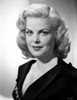Cleo Moore Posed in Black Dress with a Little Smile Photo Print - Item # VARCEL706404