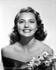Cyd Charisse smiling in Black Dress with Flowers Photo Print - Item # VARCEL706449