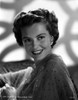 Cyd Charisse smiling in Black and White wearing a Dotted Blouse Photo Print - Item # VARCEL706457