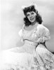 Dinah Shore Reclining in Plaid Dress Photo Print - Item # VARCEL706531