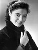 Marisa Pavan Posed in Black Suit with a Smile Photo Print - Item # VARCEL706601
