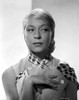 Carol Channing in a Printed Blouse with Hand on Chest Photo Print - Item # VARCEL706708